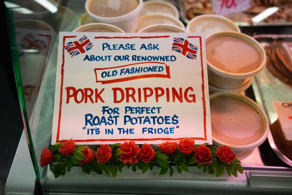 A sign offering pork dripping